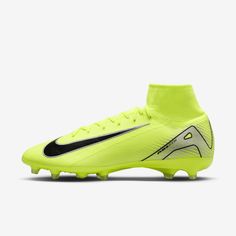 the nike meron fg soccer cleat is shown in neon yellow and black