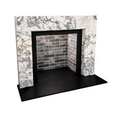 Storm Grey chamber comprising ceramic tiles glued to a fireproof, water resistant cement bonded board. Grouted with a sand and cement mixture. Shown with Shoreditch in Arabescato marble with honed granite hearth and slips. Grey Fireplace, Honed Granite, Arabescato Marble, Storm Grey, Log Burner, Wood Stove, Side Panels