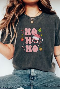 Our Ho Ho Ho tee is a fun shirt for Christmas. The comfortable  fit and cool design of this live in the moment tee means that it  feels just as good to wear as it is to look at and fits like a well-loved  favorite. If you've been looking for a gift or a cute tee-shirt for yourself,  you should get this one today. Bella + Canvas Brand Shirt ▶Unisex Adult Sizing ▶See Our Size Chart For Proper Sizing ▶Rolled sleeves are for styling purposes only ▶Props used in photos are not included with the purchase. ✈ PROCESSING & SHIPPING ✈ Processing Time: 1-2 weeks Standard Shipping: 2-5 business days after processing time ❤ Returns & Exchanges ❤ We know you will love your shirt! We have a no return and exchange policy due to the made to order nature of our items. Please contact us if you have any issue Fun Shirt, Live In The Moment, Nana Gifts, Rolled Sleeves, Mom And Sister, Friends Mom, Ho Ho Ho, Branded Shirts, Santa Christmas