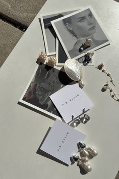 modern wedding jewelry catches the light outside next to moody imagery from a edgy bridal label. the jewelry is created with pearls, glass, bold golds and textural pearl detail. the aesthetic offers an elevated take on traditional bridal jewelry. Jewelry Store Branding, Luxurious Earrings, Street Style Jewelry, Jewellery Aesthetic, Anniversary Boyfriend Gifts, Jewellery Shop Design, Online Shop Design