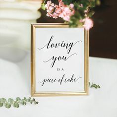 a coffee and tea bar sign sitting on top of a table next to pink flowers