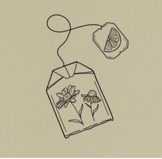 a drawing of an envelope with flowers on it and a slice of lemon in the background