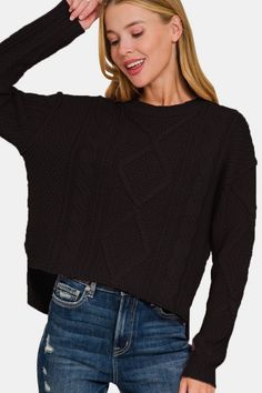 Cropped High-Low Cable Knit Sweater with Side Slits Embrace modern style with our Cropped High-Low Cable Knit Sweater. This unique piece combines a cropped silhouette, high-low hemline, and intricate cable knit detailing for a fashion-forward look. The side slits add a touch of edge and movement. Perfect for layering over high-waisted bottoms, this sweater is a versatile wardrobe essential. Key Features: Cropped silhouette High-low hemline Cable knit Side slits Material: 100% Acrylic Care Instructions: Machine wash cold Tumble dry low Size Chart (inches): Size Bust Waist S 34-36 26-28 M 37-38 29-31 L 39-40 32-33 Elevate your casual look with this trendy sweater. Sweater With Side Slits, Layering Outfits, Cable Sweater, Skirt Leggings, Casual Pullover, Denim Top, Jacket Tops, Bottoms Pants, Cable Knit