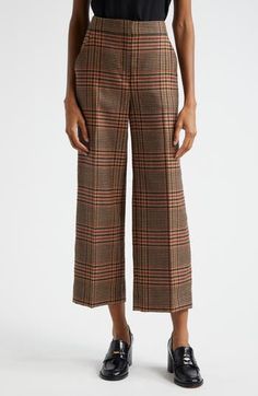 A trad plaid patterns these desk-to-dinner pants cut from warming wool in a kicky cropped length. Zip fly with hook-and-bar closure Front slant pockets; back welt pockets 100% wool Dry clean Imported Wide Leg Wool Pants, Wool Pants, Veronica Beard, Plaid Pattern, Welt Pockets, Bottoms Pants, Size 16, Womens Bottoms, Wide Leg