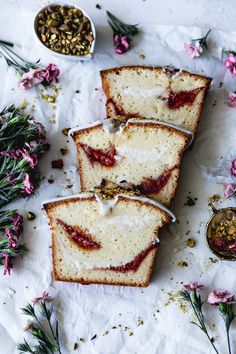 three slices of cake sitting on top of a table