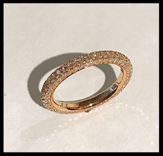 This is Bespoke, Made To Order, Handmade to fit. Handmade and Custom-Sized for a Perfect Fit. This uniquely beautiful all-around wedding ring band is pictured in 18k Rose Gold with micro-pave bright cut diamonds. These alluring stones are set on all three sides of the band. 18k Rose gold weight: 3.3 dwt. Natural round white diamonds GiA: 1.3mm; 45 Diamonds stones + 1.2mm 90 Diamonds stones = 135 stones Total carats weight: 1.15 cr. + Quality: G/ vs1 For custom orders price may vary depending on Luxury Rose Gold Eternity Band For Formal Occasions, Rose Gold Eternity Band With Halo, Luxury Rose Gold Round Eternity Band, 14k Rose Gold Pave Setting Wedding Rings, Luxury Rose Gold Eternity Band For Anniversary, Luxury Rose Gold Diamond Eternity Band, Rose Gold Diamond Ring With Pave Setting, Rose Gold Round Cut Eternity Band With Halo, Rose Gold Halo Round Cut Eternity Band