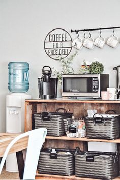 a coffee bar with baskets on the shelves