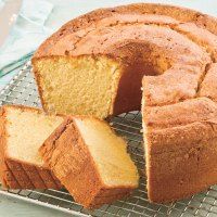 a bundt cake on a cooling rack with slices cut out