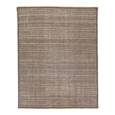 the rug is made from woven fabric and has a brown color scheme on top of it