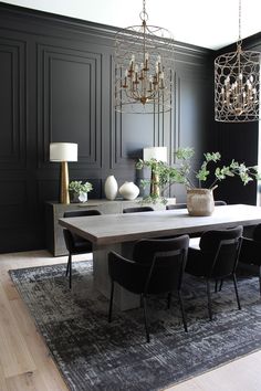 a dining room table with chairs and chandelier