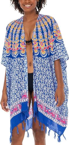 Versatile Style Add flair to your beach attire with our Mandala-designed women's kimonos for summer. Featuring a beautiful batik print, these kimonos can be worn as a chic cardigan or stylish layering piece for everyday outfits. The playful fringes on the beach kimono cover-ups create movement and visual interest, perfect for beach walks or lounging. Stylish Sun Protection & Roomy Fit Our beach kimono cardigans offer additional coverage from harmful UV rays while allowing you to express your uni Bohemian Lightweight Cover-up For Beach Party, Multicolor Summer Kimono For Beach Cover-up, Printed Beach Cover-up With Kimono Sleeves, Bohemian V-neck Cover-up With Tropical Print, Bohemian V-neck Tropical Print Cover-up, Printed Kimono Beach Cover-up For Beach Season, Blue Bohemian Cover-up For Beach Party, Blue Flowy Cover-up For Beach Season, Blue Open Front Cover-up For Vacation