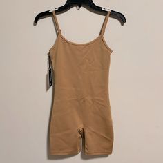 Nwt Tna Aritzia Tnagloss Rhythm 7" Romper In Caramelized Brown Size Small Brand New With Tags- Never Worn. No Flaws. This Is A Scoop-Neck Romper With Adjustable Straps. It’s Made With Tnagloss A Contouring, Body-Hugging Fabric With A Luxe Sheen And Sleek Feel Features High-Visibility Spiro Materials & Care Content: 85% Nylon, 15% Elastane Care: Machine Wash Imported Fit: Tight A Close Fit That Hugs The Body Length: 7" Intended To Hit Around Lower Thigh Model Is 5'7"/170cm Wearing A Size S Aritzia Jumpsuit, Silk Romper, Vintage Chanel Handbags, Aritzia Pants, Wrap Romper, Seersucker Pants, Coral Peach, White Halter Maxi Dress, Pleated Mini Skirt