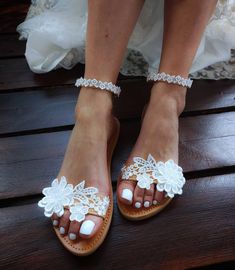 These beautiful wedding sandals are the perfect touch to beautify your wedding day!Are decorated with a white cotton trims and floral motifs They are finished with an adjustable bunkle strap for a secure and comfortable fit. FULL SIZE ONLY: ** If you have half the size, go UP to the nearest full size Check out our other wedding sandals here: WEDDING SANDALS WITH FLOWERS : https://www.etsy.com/listing/733048299/wedding-sandals-barefoot-sandals-bridal?ref=shop_home_active_7&pro=1&frs=1 htt Adjustable Flat Sandals For Wedding, Flats For Bride, Bridesmaid Shoes Flat, Wedding Flats For Bride, Sandals For Bride, Wedding Sandals For Bride, Bride Sandals, Sandals Wedding, Bride Floral