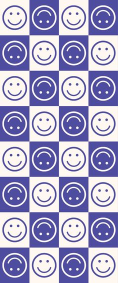 a blue and white checkered pattern with smiley faces on it's sides photo