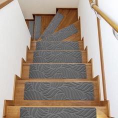 a set of stairs with decorative carpet on them