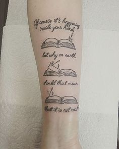 a person with a book tattoo on their leg