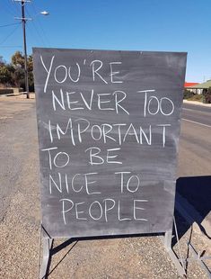 a sign that reads, you're never too important to be nice to people