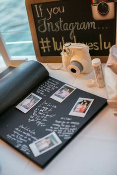 an instagram page on a table next to a polaroid camera and other items