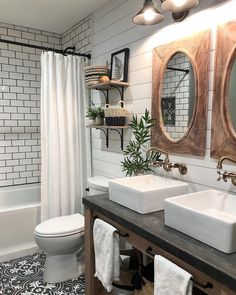 the bathroom is decorated in black and white