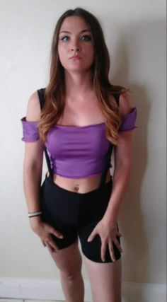 Strechy black latex material for  bottoms with suspenders attached to shorts. Looks cute with any crop top or tank top. Nice form fitting bottoms in cropped legging style. Goes down mid-high thigh or can be short shorts. Top is off shoulder crop top in purple. Material for top is also performance wear in the prettiest shade purple. Nice and tight fitted top to show off your lovely figure. Edgy Stretch Crop Top With Tank Straps, Stretch Crop Top For Cosplay, Fitted Edgy Purple Bottoms, Trendy Fitted Bottoms With Suspenders, Edgy Fitted Purple Bottoms, Alternative Stretch Crop Top For Summer, Legging Shorts, Belle Silhouette, Crop Top And Leggings