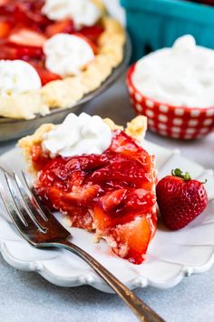 a slice of strawberry pie with whipped cream on top