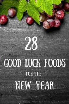 grapes and leaves with the words 28 good luck foods for the new year