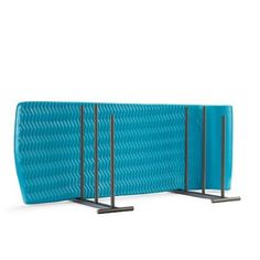 a blue rectangular object with metal poles on it