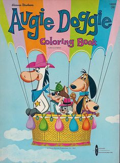 an image of a cartoon book with dogs riding in a hot air balloon