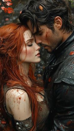 a woman with red hair and a man in black leather clothes are embracing each other