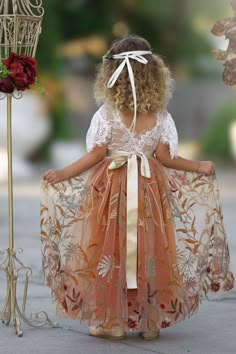 Our burnt orange floral embroidered short sleeve flower girl dress is perfect for fall or BoHo style weddings. Featuring a stunning V-shaped back with eyelash lace and ankle-length skirting, this dress suits toddlers, girls, and junior bridesmaids. Ideal for weddings, family photo shoots, or special occasions. Choose from plain, jeweled, or custom-made floral sashes. Note your sash color and custom flower preferences at checkout. Link to Matching Hair Accessories: https://www.littlekittenboutiqu Fall Flower Girl, Fall Flower Girl Dresses, Floral Sash, Junior Bridesmaids, Custom Sash, Boho Style Wedding, Elegant Fall, Junior Bridesmaid