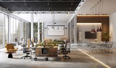 an office with lots of chairs and desks in the middle of it's room