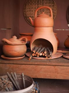 an old clay pot and other items on a table royalty images, stock photos & more