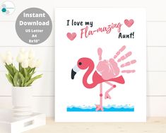 a pink flamingo is standing in the water with his handprinted name on it