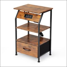 a wooden table with two drawers and a clock on the top one drawer is open