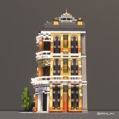 a very tall building with lots of windows and balconies on the top floor