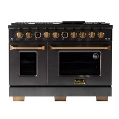 a black and gold stove with two ovens