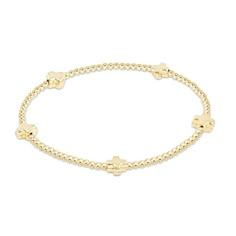 eGirl Signature Cross Small Gold Pattern 2mm Bead Bracelet Girl Bracelet ENewton Egirl Bracelets, Enewton Bracelet, 2mm Bead Bracelet, Hanukkah Ideas, Jewelry Stack, Cross Gold, Wrist Stacks, Expensive Jewelry Luxury, Classic Bracelets