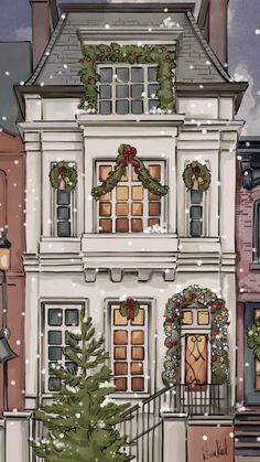 a large white house with christmas wreaths on it's windows and balconyes