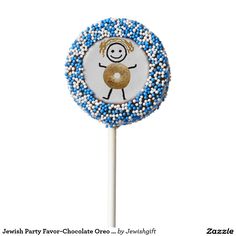 a blue and white lollipop with the word oh baby on it's top