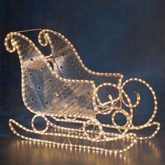 a lighted sleigh with lights on it