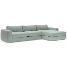 a light blue sectional sofa on a white background