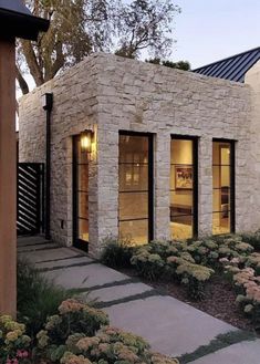 a house made out of stone and brick