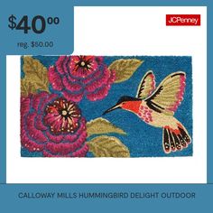 a blue rug with pink flowers and a hummingbird on it, $ 40 00