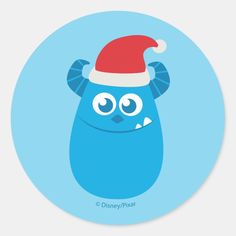 a blue monster with a santa hat on it's head is in a circle