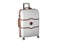 Delsey Chatelet Hard - 24 Spinner Trolley (Champagne) Luggage. This 24 Spinner Trolley is part of the Delsey Châtelet Collection. Travel can now be practical and look sophisticated with the polished Chatelet collection! Made from bayer 100% BAYER virgin makrolon polycarbonate formulated to achieve the highest standards of extreme temperature and impact resistance. Telescoping handle locks in two positions to accommodate two or #Delsey #BagsandLuggage #Luggage #GeneralLuggage #Gold Packing Toiletries, Look Sophisticated, Hardside Luggage, Organized Packing, Suitcases, Champagne