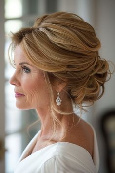 10+ Stunning Half Up Styles For Mother Of The Bride - NeedleStar Mother Of Bride Half Up Half Down, Mother Of The Bride Bun Hairstyles, Wedding Hair Older Bride Over 50, Half Up Half Down Wedding Hair Mother, Mother Groom Hairstyles, Mother Of Bride Updos For Medium Hair, Mother Of The Bride Low Bun, Mother Of The Groom Hair Updo, Mother Of The Bride Partial Updo