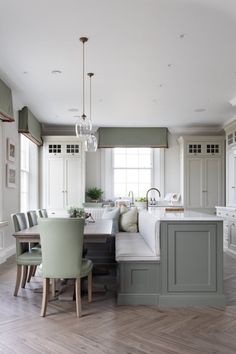 the kitchen is clean and ready to be used as a breakfast nook or dining room