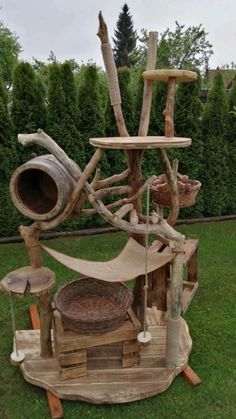 a sculpture made out of wood sticks and other items