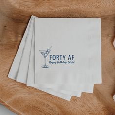 four napkins with the words forty af on them