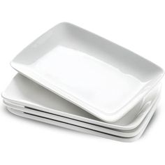 three white plates stacked on top of each other with one empty plate in the middle